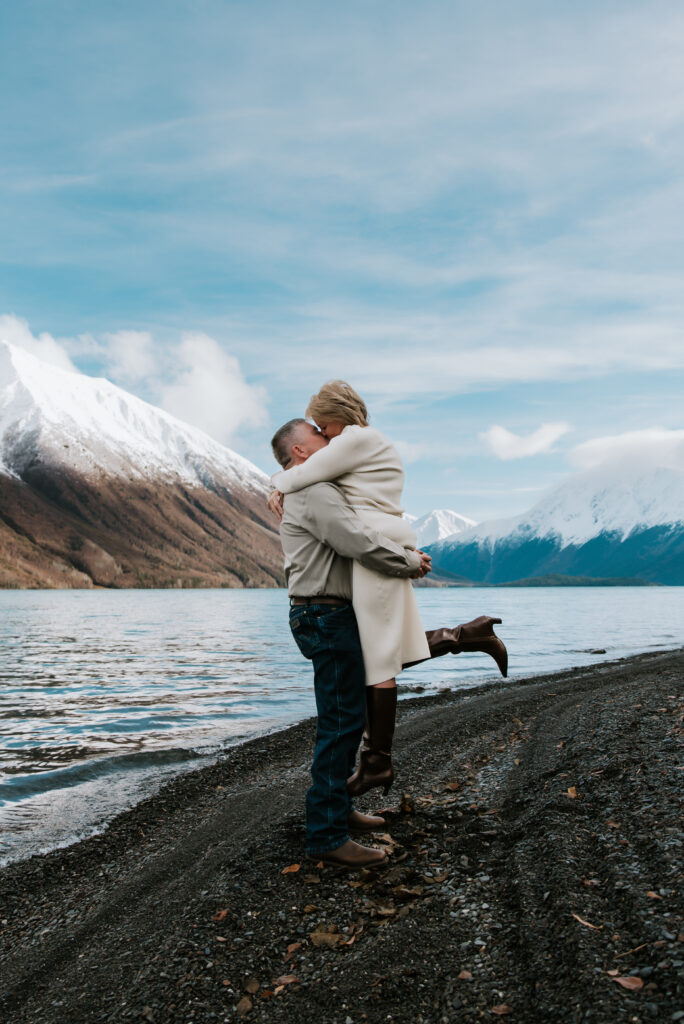 An intimate Alaska Elopement, lakeside, surrounded by mountains.